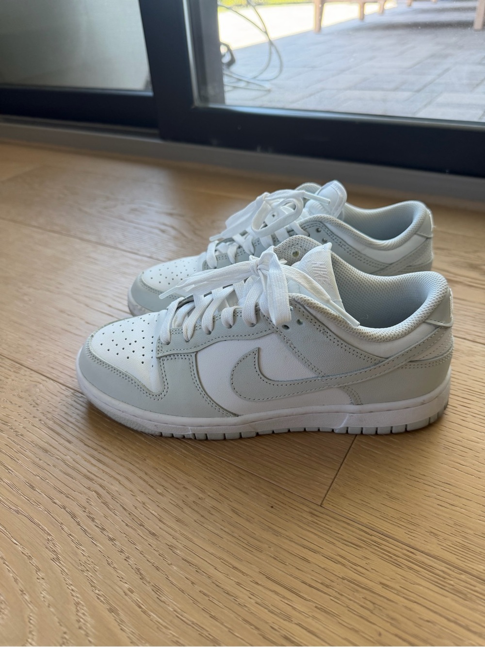 Nike Women's Dunk Low in White and Light Gray